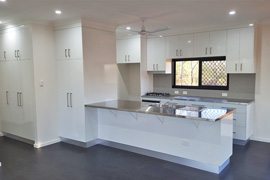 Kitchen with stainless steel benchtops