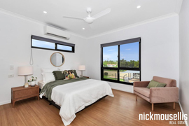 Outdoor living area with wooden ceiling fans