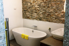 Bathroom with freestanding bathtub