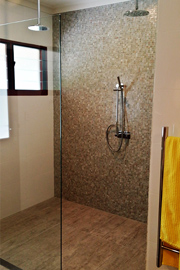 Large shower recess in bathroom