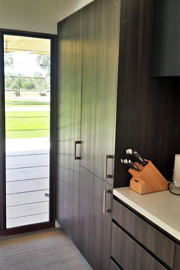Kitchen designed with hidden fridge cabinet