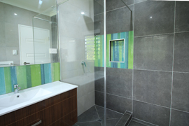 Modern bathroom with timber vanity cabinet